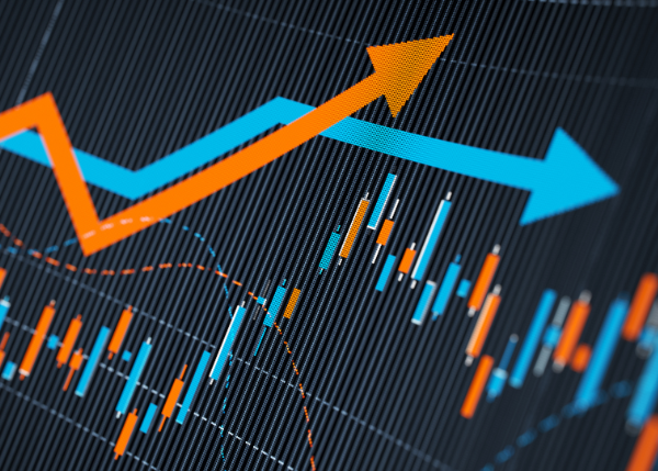 Blue and orange trending arrows on a digital graph
