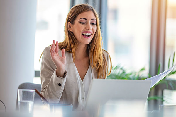 woman talking on computer