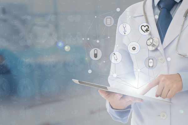 person wearing a lab coat and holding tablet with virtual healthcare icons