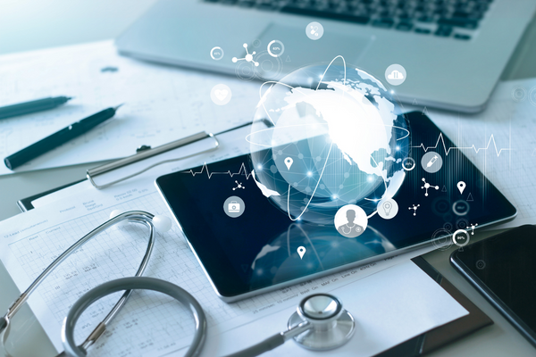 tablet with stethoscope and medical icons