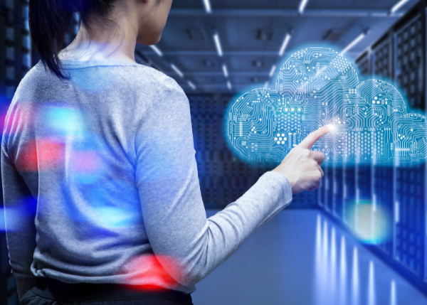 woman pointing to virtual cloud graphic