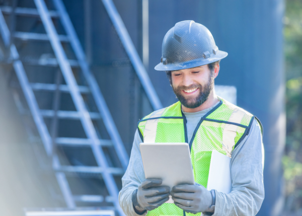 utility worker using tablet