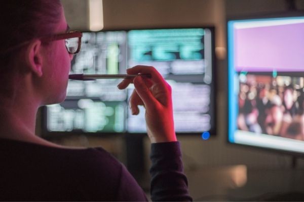 woman working on computer system