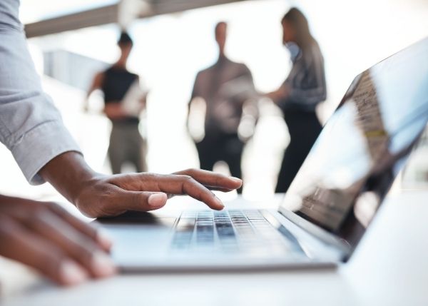people working together on computer