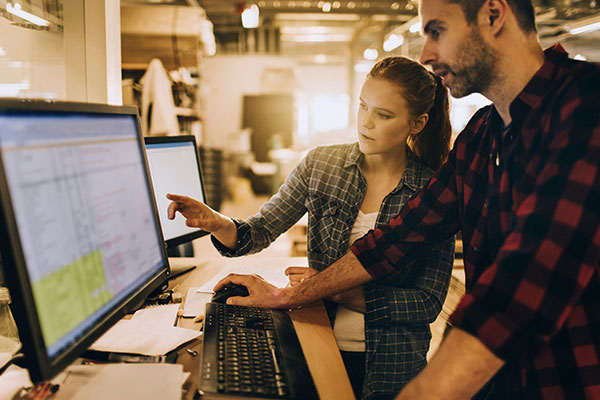 people pointing to computer