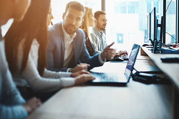 Four people working 