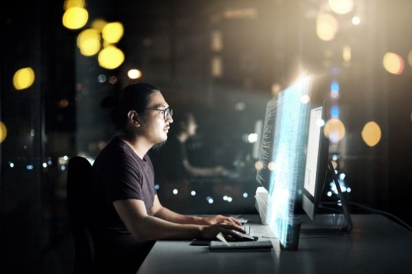 person coding computer program