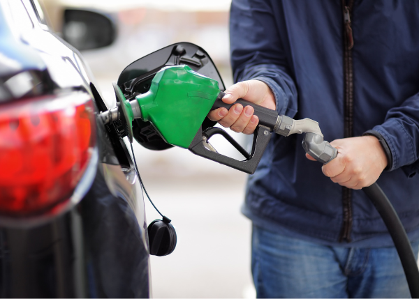 Person pumping gas