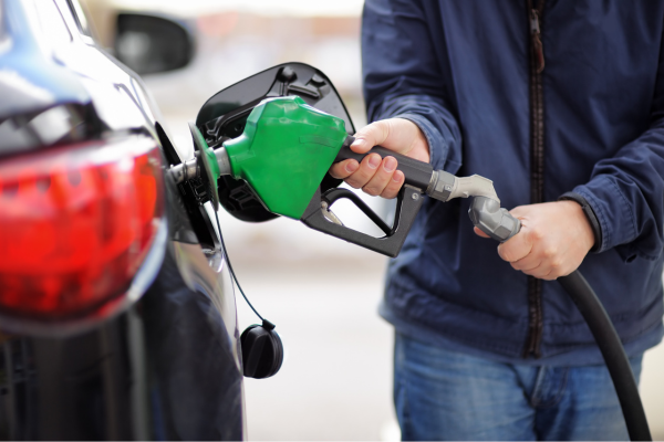 Person pumping gas