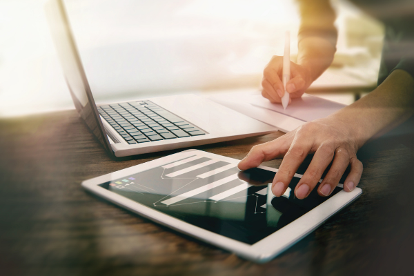 person using interactive analytics on tablet