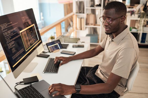 a man looking at a development dashboard