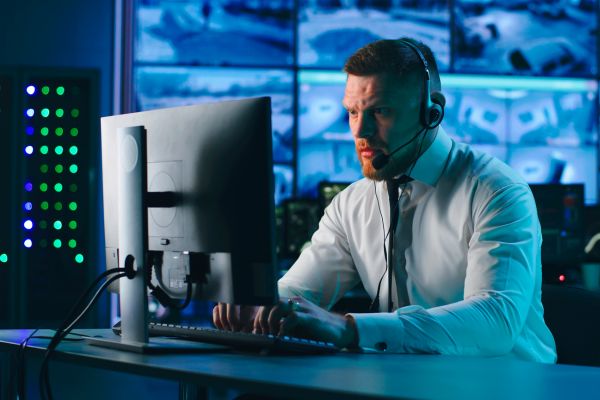 a man sitting at a computer