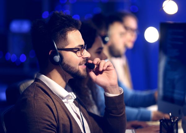 three technical support professionals working