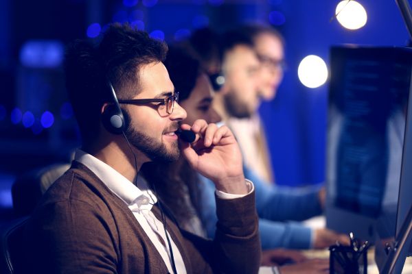 three technical support professionals working
