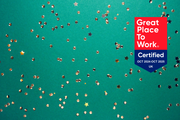 Green background with gold stars and beads scattered