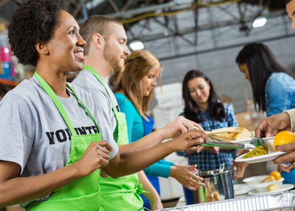 Volunteers feeding the homeless