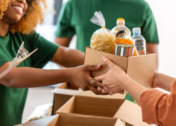 Charity handing out a box of food donations
