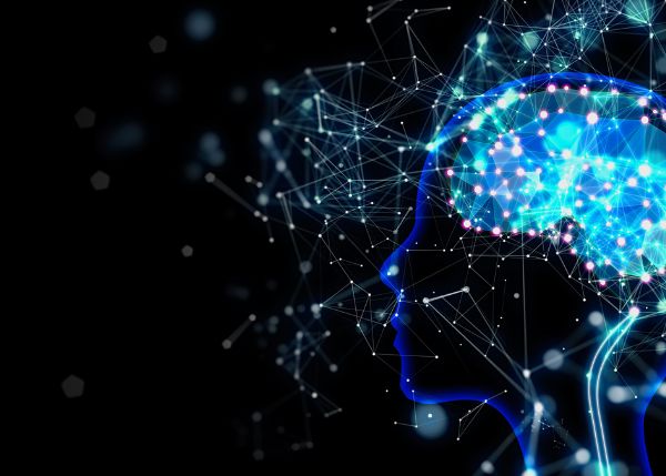 abstract image of person's profile with brightly lit brain and pathways around it