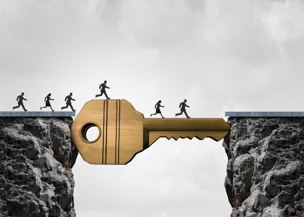 Business executives crossing a key