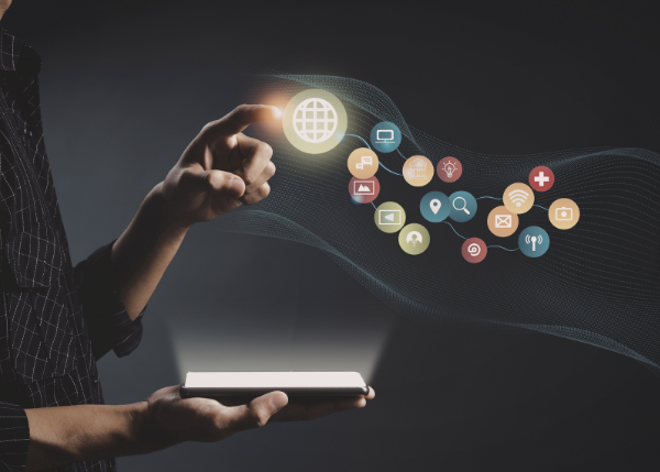 Person reaching out and interacting with technology touch points