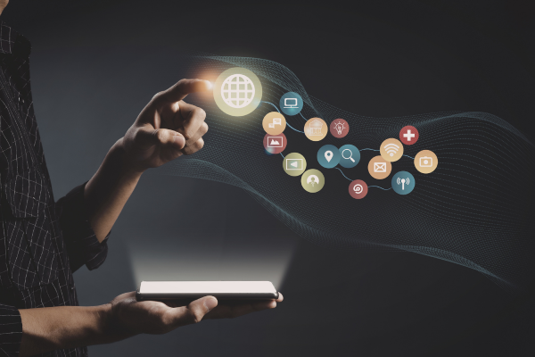 Person reaching out and interacting with technology touch points