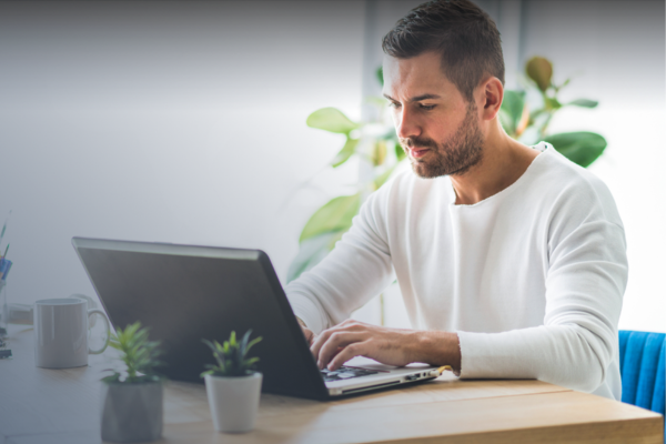 Man on computer searching the web