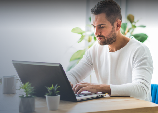 Man on computer searching the web