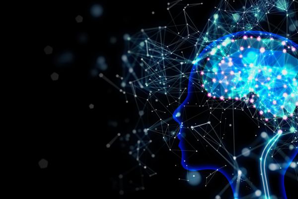 abstract image of person's profile with brightly lit brain and pathways around it