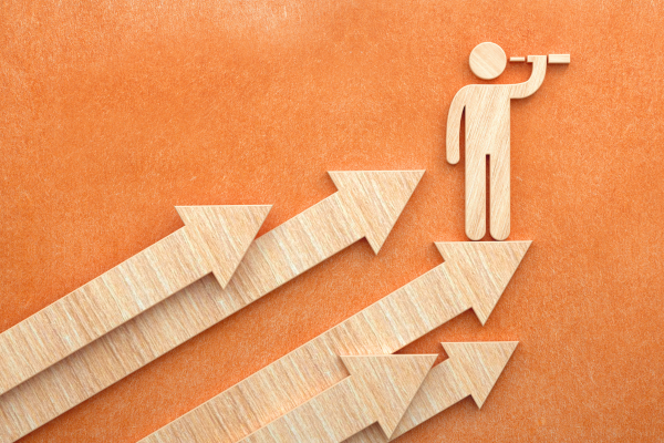 Arrows pointing up with a person looking out 