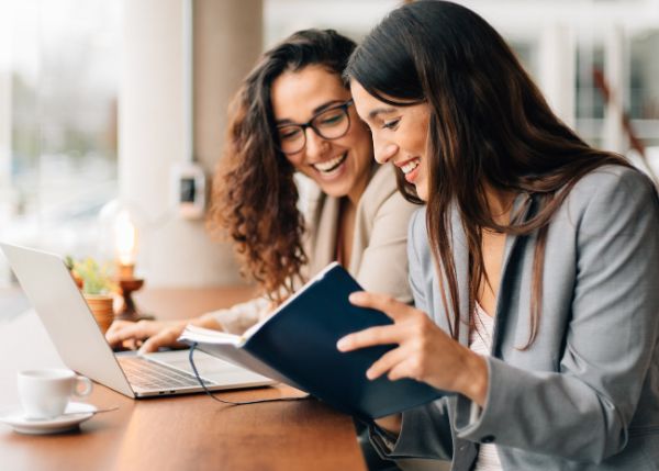 Two women collaborating at work