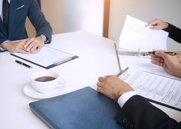 Professionals working on resumes