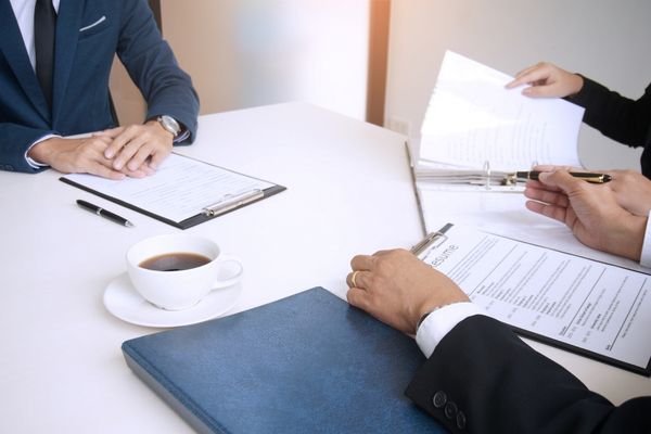Professionals working on resumes