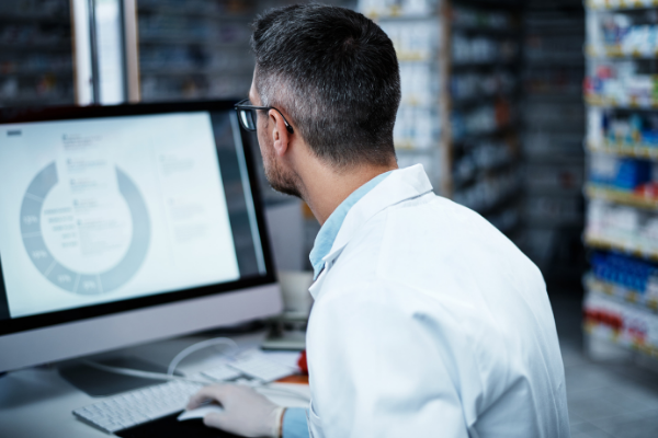 medical professional using computer program