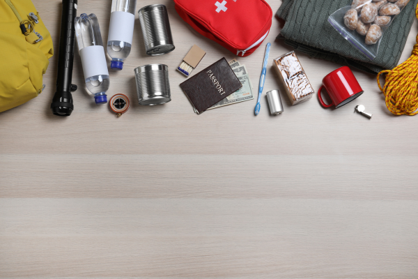 Flashlight, water, survival gear