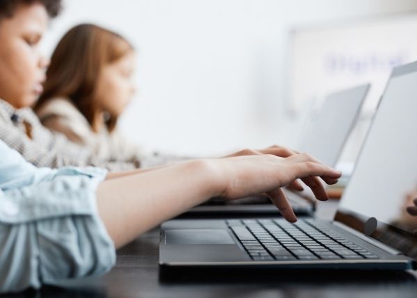 Kids typing on the computer