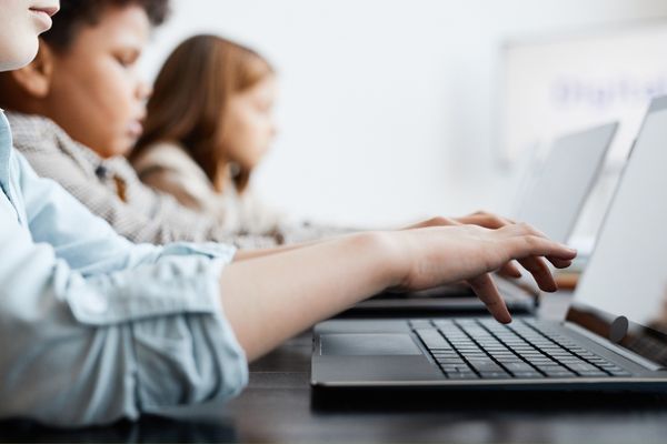 Kids typing on the computer