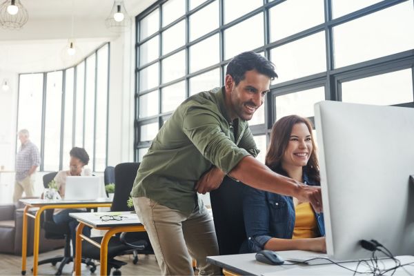 Man coaching an employee at work