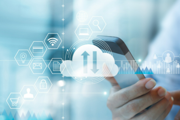 Hands holding smartphone, Page overlaid with transparent graphics of cloud and other technical graphics